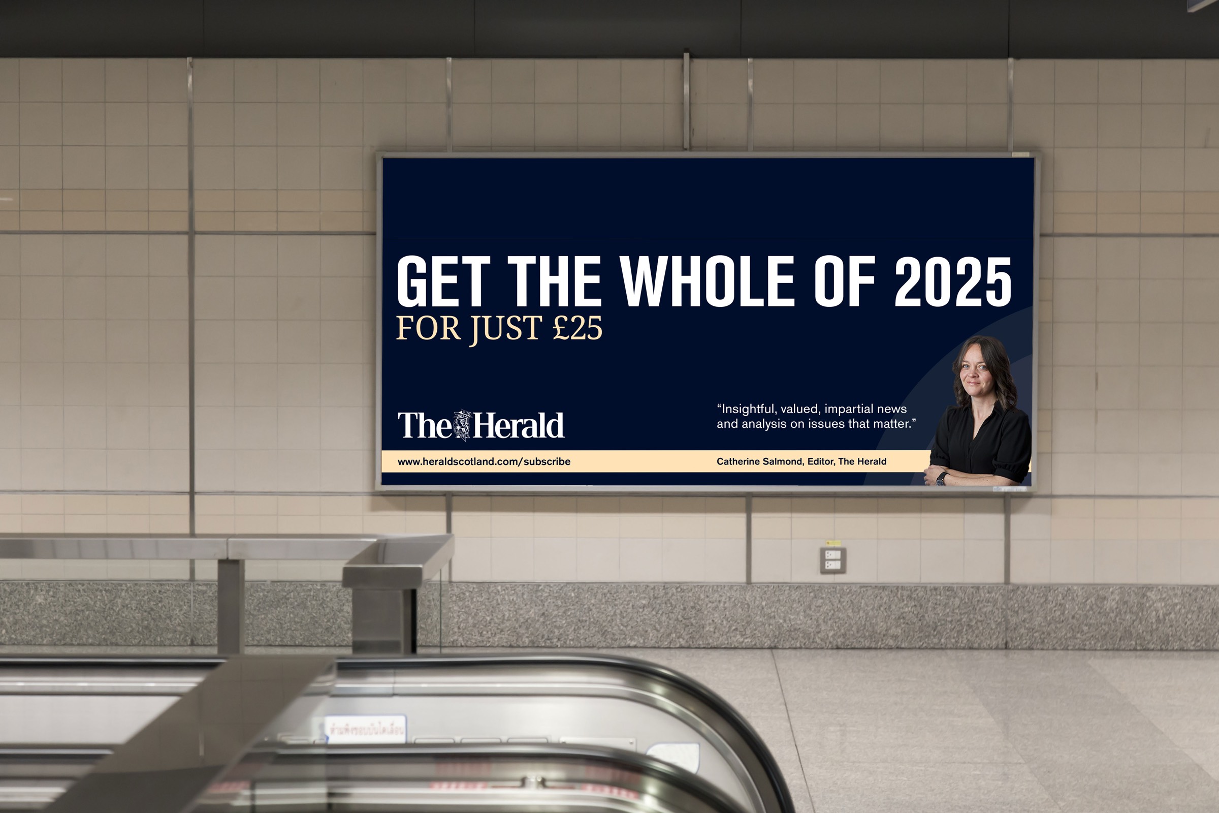 The Herald 25 for £25 billboard above a train-station escalator