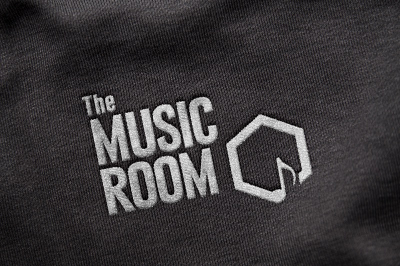 The Music Room logo concept embossed on fabric