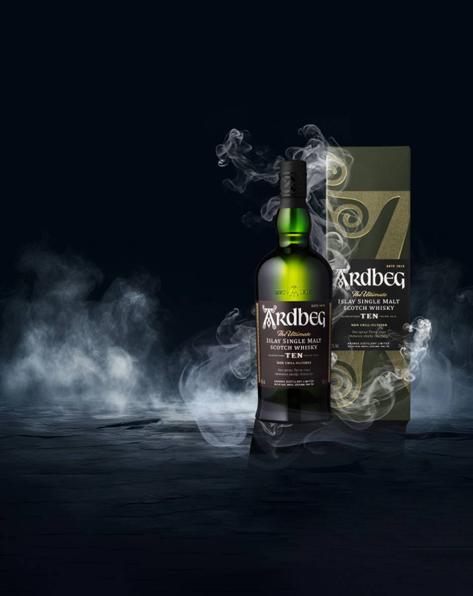 Ardbeg Ten bottle and box in smoke — the campaign key visual